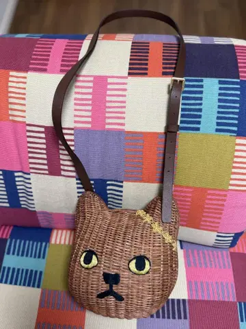 고양이 얼굴 모양 바스켓백