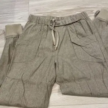 베이지 허리밴딩 포켓 부착 팬츠