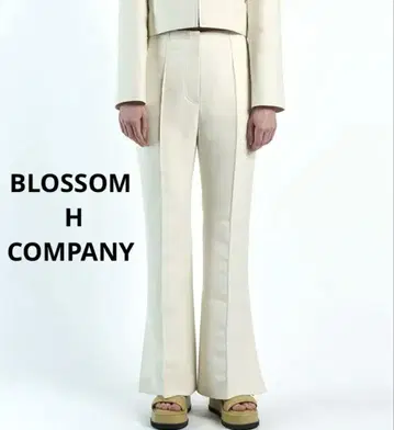 BLOSSOM H COMPANY 화이트 플레어 팬츠 슬릿