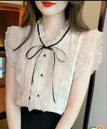 애프리콧 컬러 프릴 슬리브리스 블라우스