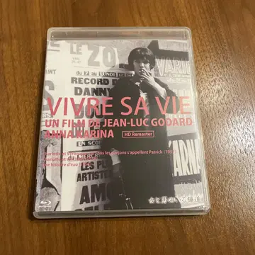 여자와 남자가 있는 포장 도로 ('62 불)