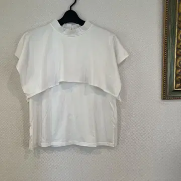 화이트 슬리브리스 케이프 야드 컷 티셔츠