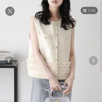 프릴 밑단 숏 베스트