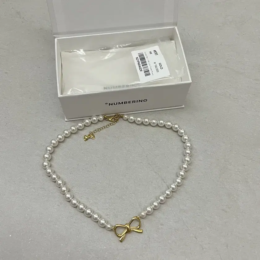 Numbering Ribbon Pearl Necklace #9701 on Bunjang Global Site.