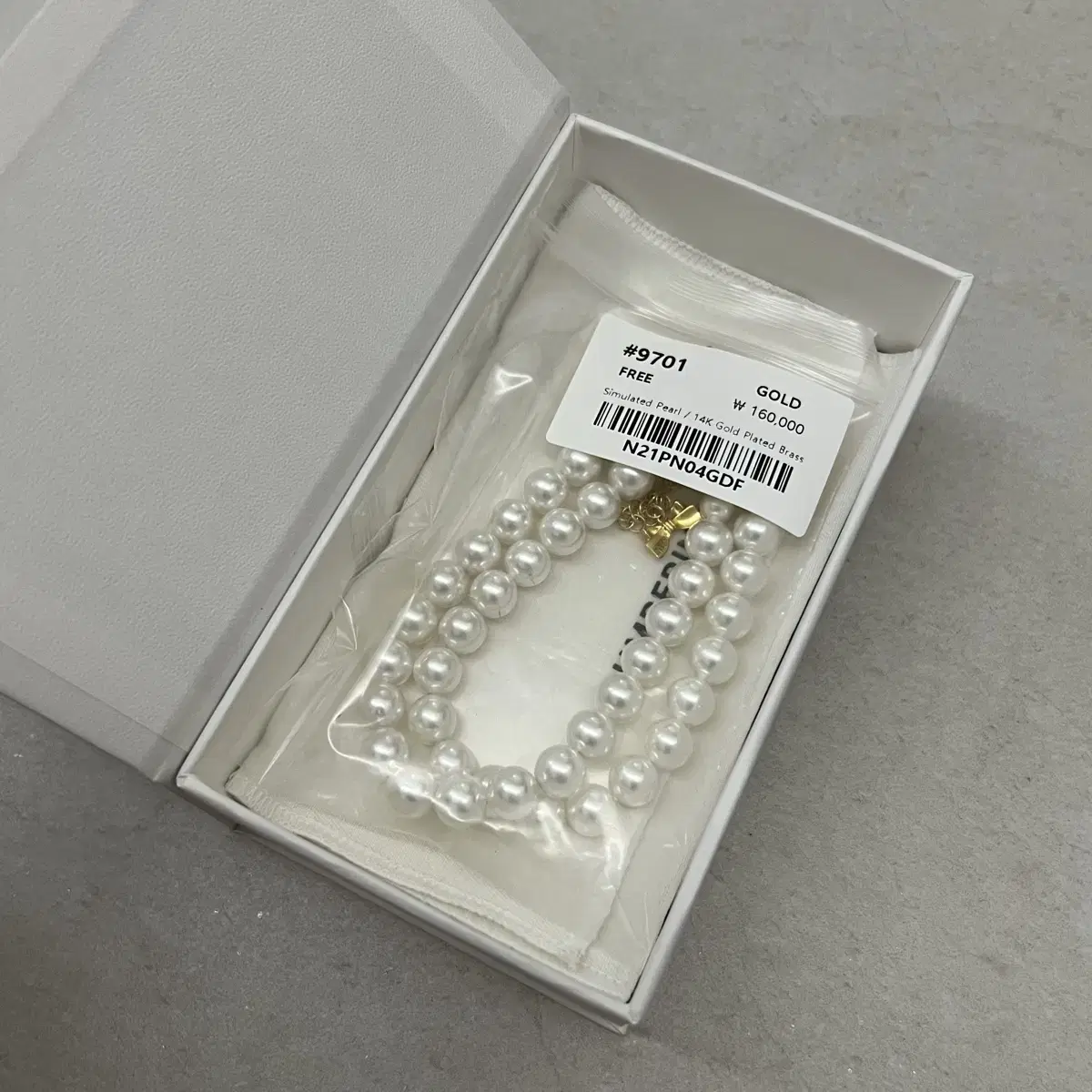Numbering Ribbon Pearl Necklace #9701 on Bunjang Global Site.