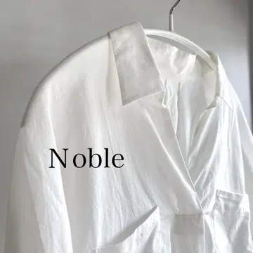 Noble 스키퍼 셔츠 7부 소매 화이트 코튼 돌먼 슬리브