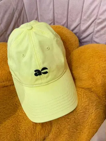 ae 로고 캡 밝은 노랑 컬러