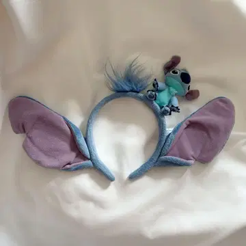 스티치 봉제 인형이 달린 머리띠