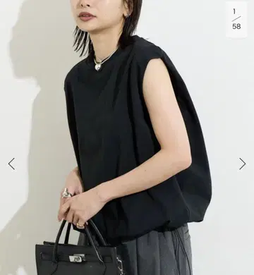 JOURNALSTANDARD 저널 스탠다드 셔링 슬리브리스 T