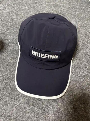 브리핑 레인 캡 네이비