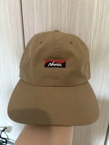 NANKA 로고가 들어간 베이지 캡