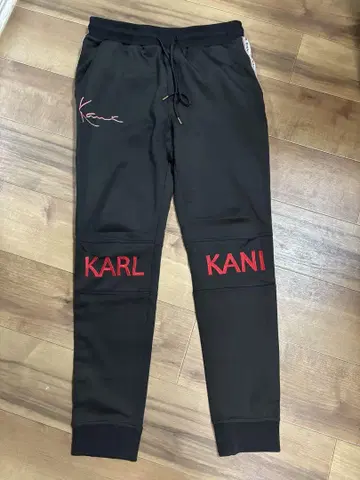 KANI 블랙 조거 팬츠