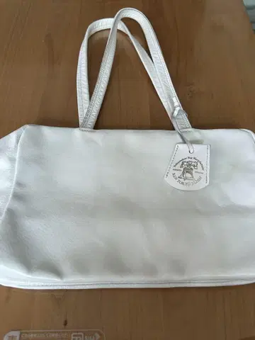 REN 화이트 가죽 토트백
