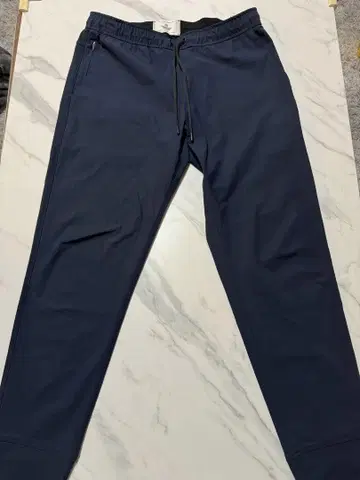 REIGNING CHAMP 네이비 슬랙스 M