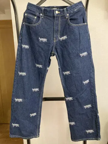 XLARGE ALLOVER LOGO DENIM PANTS