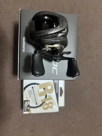 24 메타늄 DC70xg 낚시릴 R18 라인 포함