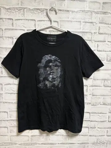 블랙 얼굴 프린트 티셔츠 달탐보나파르트