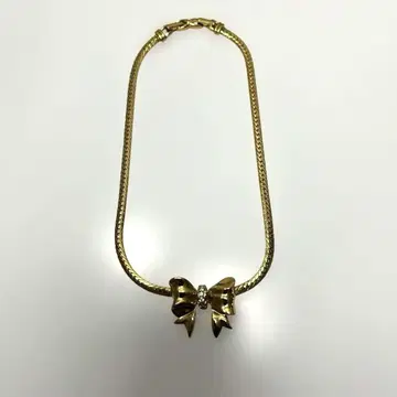 Nina Ricci 리본 모티브 골드 톤 목걸이