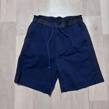 사카이 sacai 14SS 헤비 코튼 이소재 절개 숏 팬츠