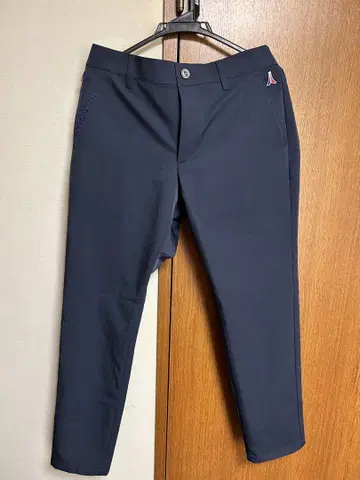 LE COQ SPORTIF 네이비 슬림 핏 팬츠