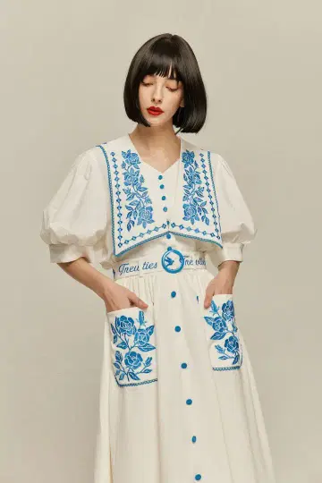 이 요리에는 당근이 들어 있습니다. TNEWTIES 자수 블라우스