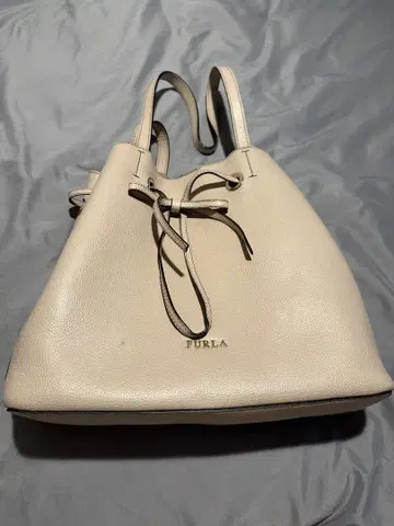 훌라 베이지 복조리 핸드백