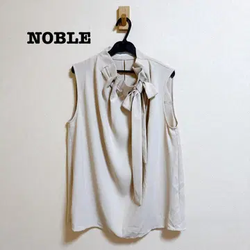 NOBLE 개더 보타이 슬리브리스 블라우스