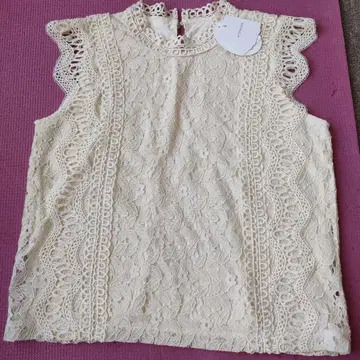 Petite Fleur 아이보리 슬리브리스 탑 F 사이즈