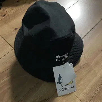 새상품 문구와 함께 버킷 햇 블랙 57cm