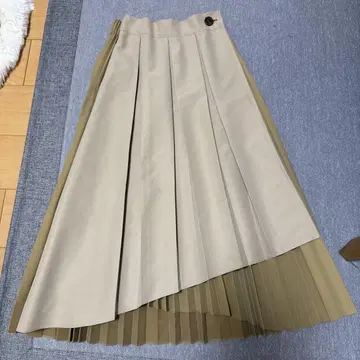 TORANOI. 비대칭 플리츠 스커트 야마다 야토노이