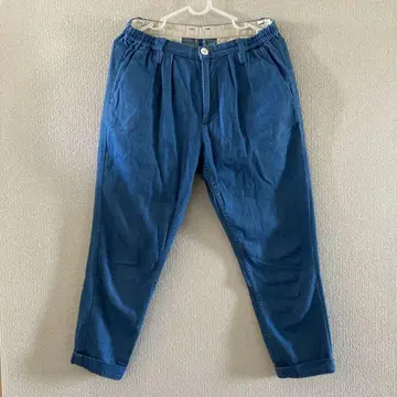 오디너리 피츠 턱 테이퍼드 팬츠