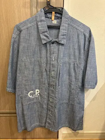 CP 컴퍼니 | 단추 없는 반팔 셔츠