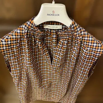 CEDRIC CHARLIER 슬리브리스 블라우스