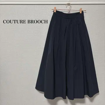 COUTURE BROOCH 네이비 플레어 스커트
