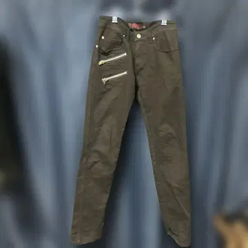 TRIPP NYC의 지퍼가 달린 블랙 팬츠입니다.