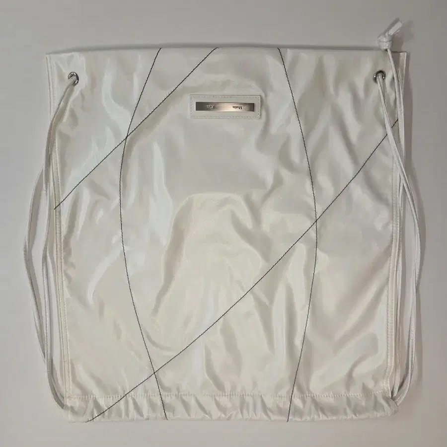 バックパック・リュック [MATINKIM]string coating back pack in white MATIN KIM | 마뗑킴 Matin Kim String Coated Backpack White