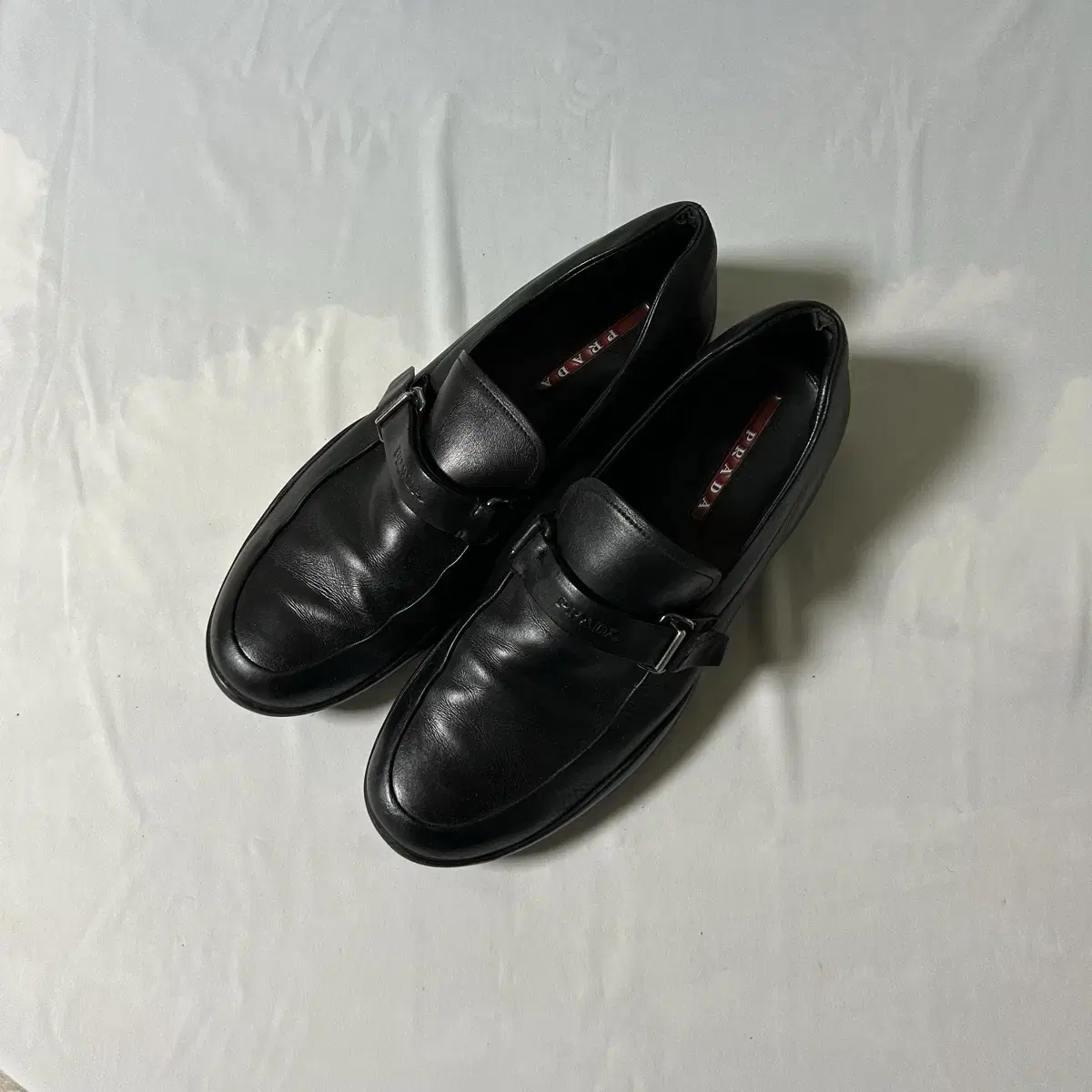 PRADA | 프라다 Prada sports lace-up cap-toe derby shoes on