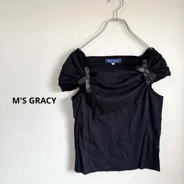 M'S GRACY 오프숄더 블랙 슬리브리스 상의