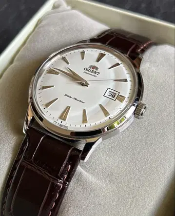 ORIENT 밴비노 오토매틱 시계 화이트 다이얼 SAC00005W0