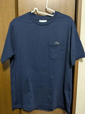 Lacoste 네이비 티셔츠 가슴 포켓 부착