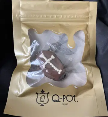 Q-pot. 관 케이크 백 참
