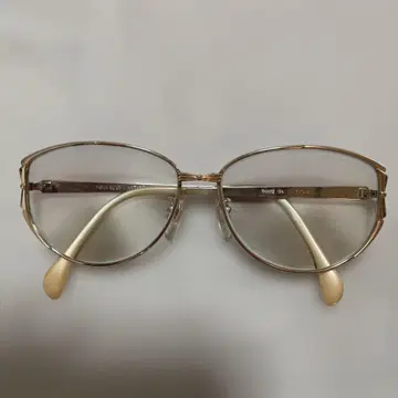 NINA RICCI Titan 티타늄 오벌 프레임 안경
