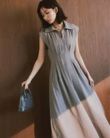 멜란지 하프 지퍼 슬리브리스 턱 원피스