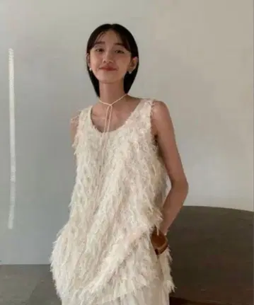 클라네 W FACE CROSS FRINGE TOPS