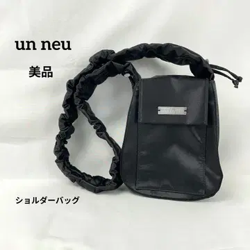 새상품급 un neu 안노이 셔링 스트랩 숄더백 블랙
