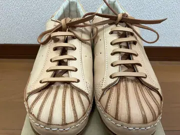 Hendor Schome 베이지 스니커즈