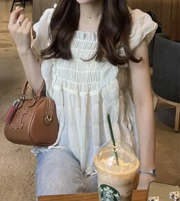 nelliy 프릴 셔링 시어 블라우스