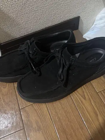 Clarks 블랙 모카신 왈라비