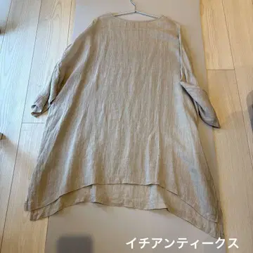 베이지 색의 오분 소매 튜닉