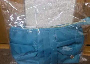 TOCCA CLUTCH OF KNOT POUCH 파우치